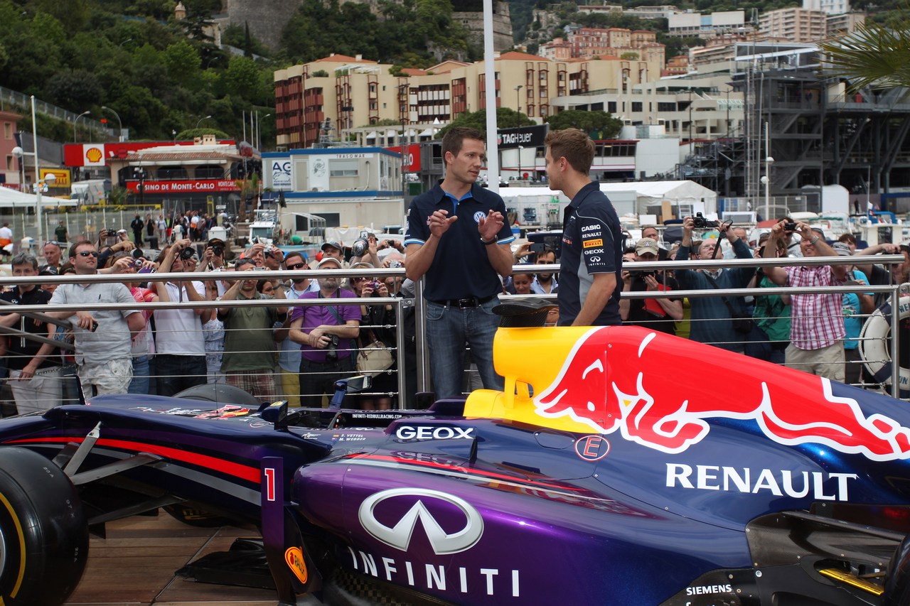 22.05.2013- Sebastian Vettel (GER) Red Bull Racing RB9 and Sebastien Ogier (F) WRC Driver