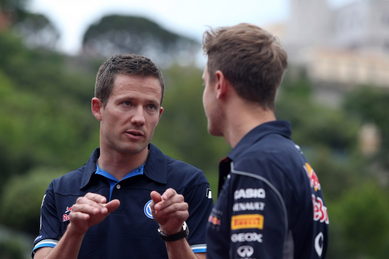 22.05.2013- Sebastian Vettel (GER) Red Bull Racing RB9 and Sebastien Ogier (F) WRC Driver