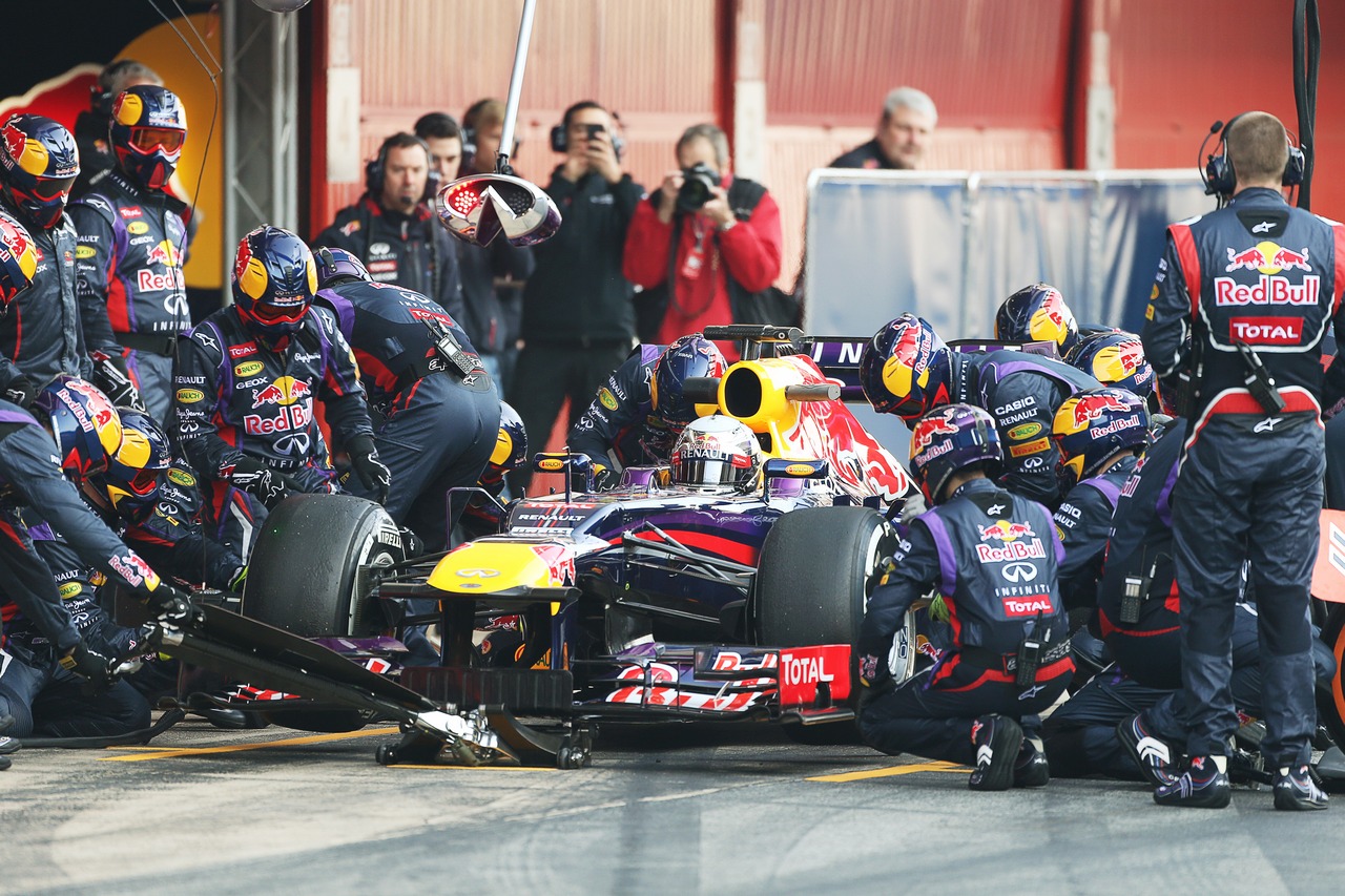 Sebastian Vettel (GER) Red Bull Racing RB9 practices pit stops.
