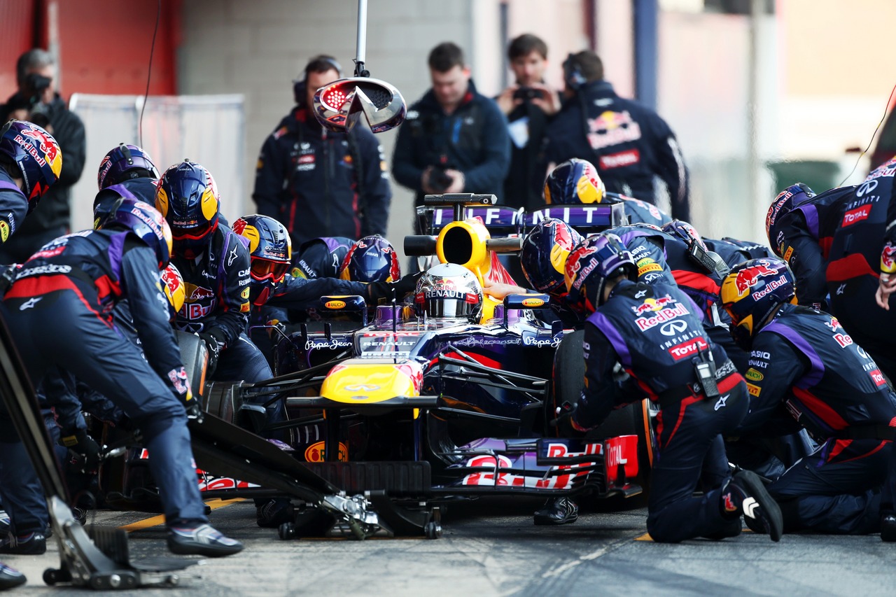 Sebastian Vettel (GER) Red Bull Racing RB9 practices pit stops.

