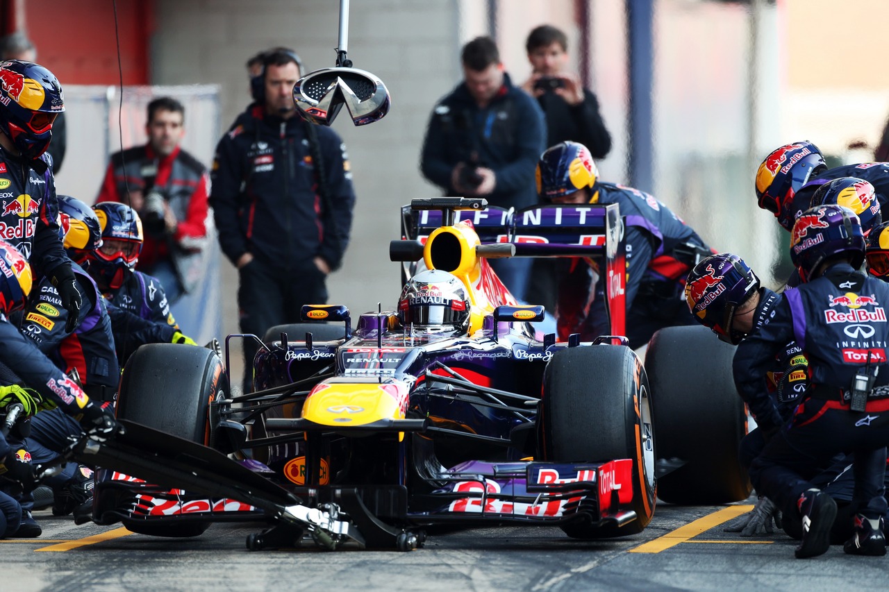Sebastian Vettel (GER) Red Bull Racing RB9 practices pit stops.
