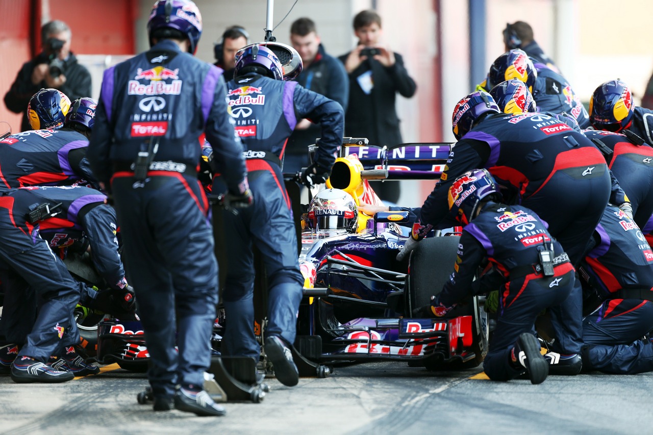 Sebastian Vettel (GER) Red Bull Racing RB9 practices pit stops.
