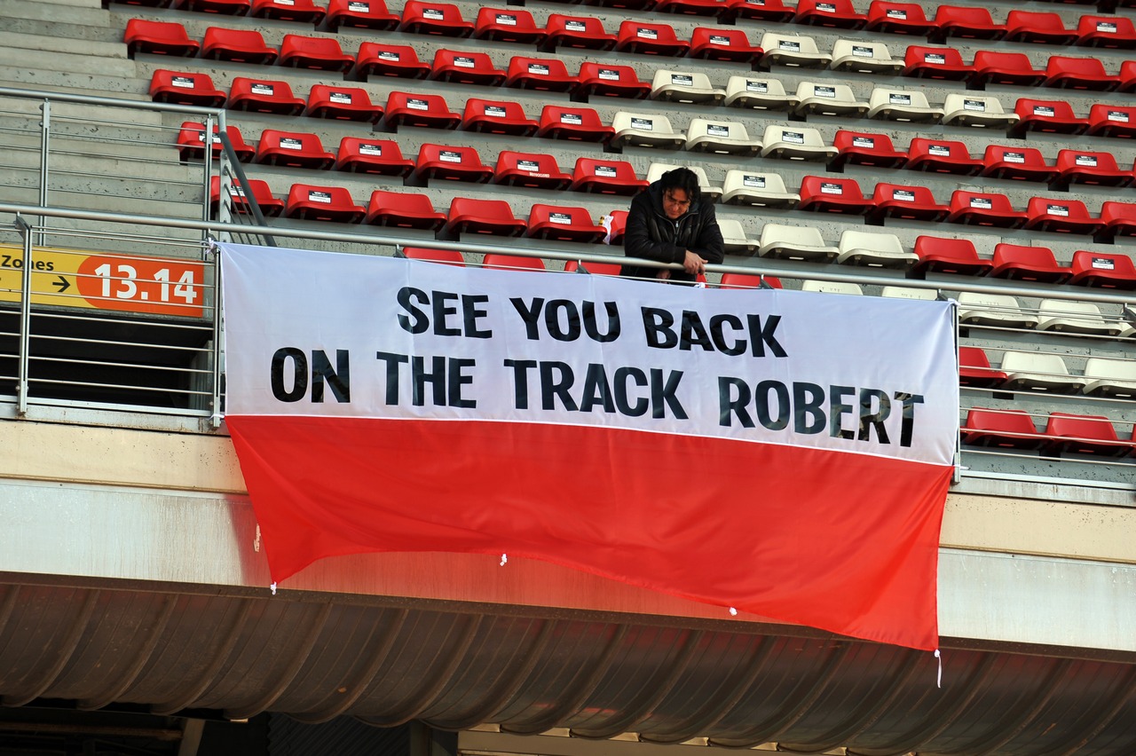 Banner for Robert Kubica (POL).
