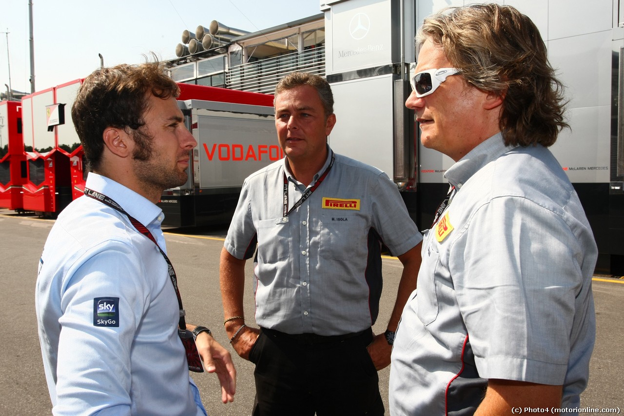 05.09.2013- Luca Filippi (ITA) Sky Italia with Mario Isola (ITA), Sporting Director Pirelli