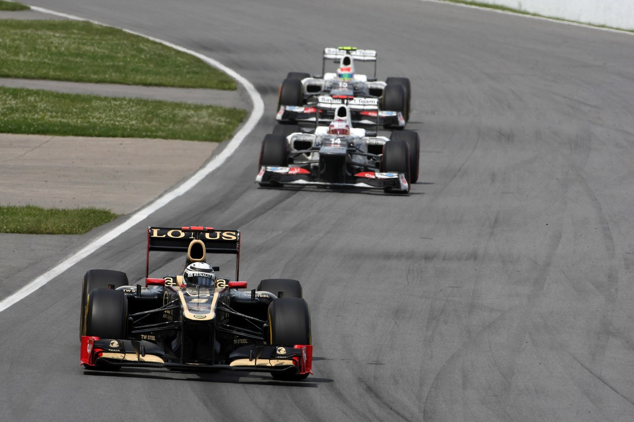 10.06.2012- Race, Kimi Raikkonen (FIN) Lotus F1 Team E20 leads Kamui Kobayashi (JAP) Sauber F1 Team C31 and Sergio Pérez (MEX) Sauber F1 Team C31 
