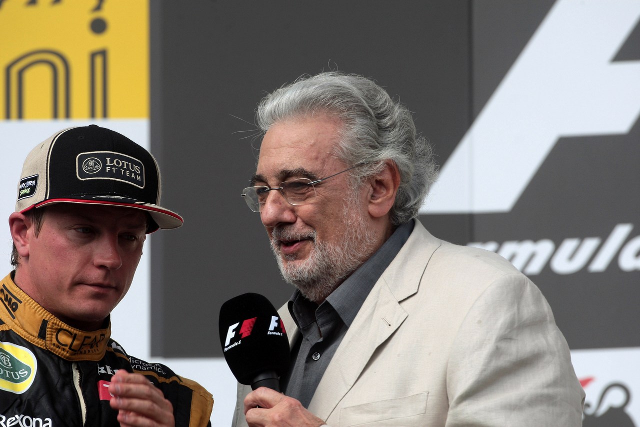 29.07.2012- Race, Placido Domingo (ESP), Tenor and Kimi Raikkonen (FIN) Lotus F1 Team E20 2nd position 