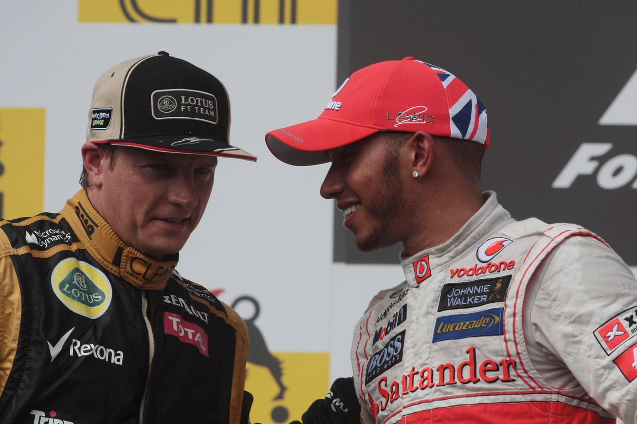 29.07.2012- Race, 2nd position Kimi Raikkonen (FIN) Lotus F1 Team E20 and Lewis Hamilton (GBR) McLaren Mercedes MP4-27 race winner