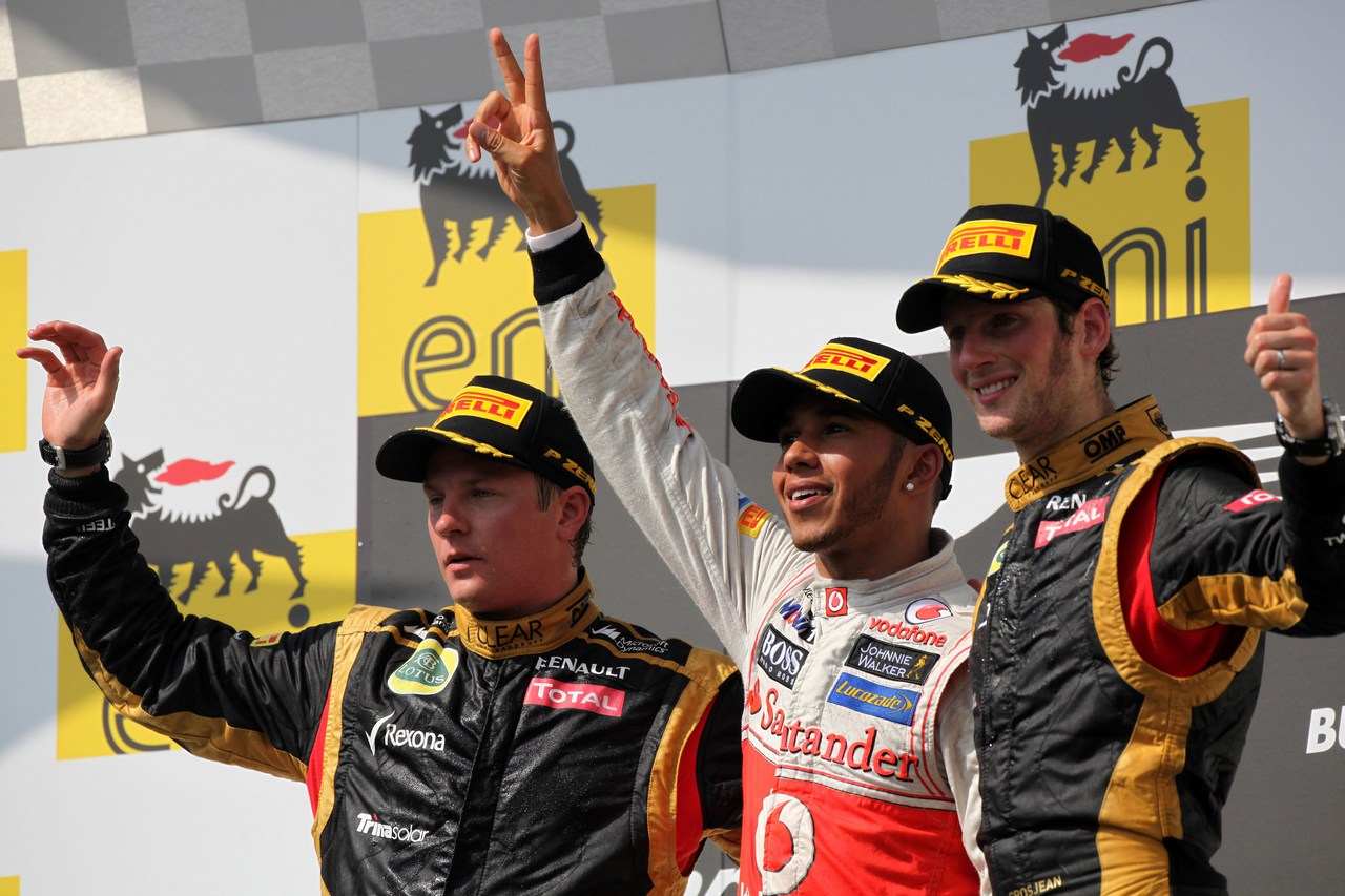 29.07.2012- Race, Lewis Hamilton (GBR) McLaren Mercedes MP4-27 race winner, 2nd position Kimi Raikkonen (FIN) Lotus F1 Team E20 and 3rd position Romain Grosjean (FRA) Lotus F1 Team E20 