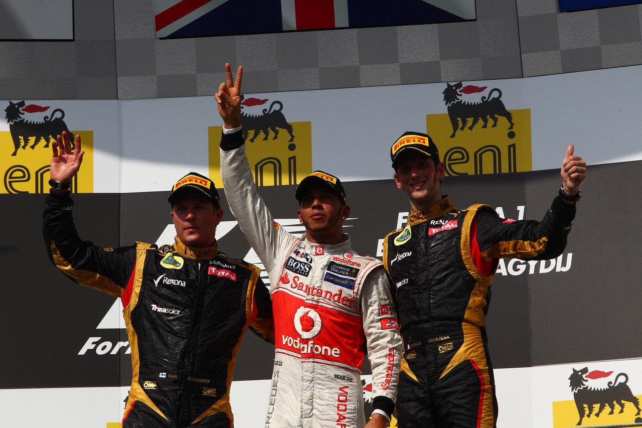 29.07.2012- Race, Lewis Hamilton (GBR) McLaren Mercedes MP4-27 race winner, 2nd position Kimi Raikkonen (FIN) Lotus F1 Team E20 and 3rd position Romain Grosjean (FRA) Lotus F1 Team E20
