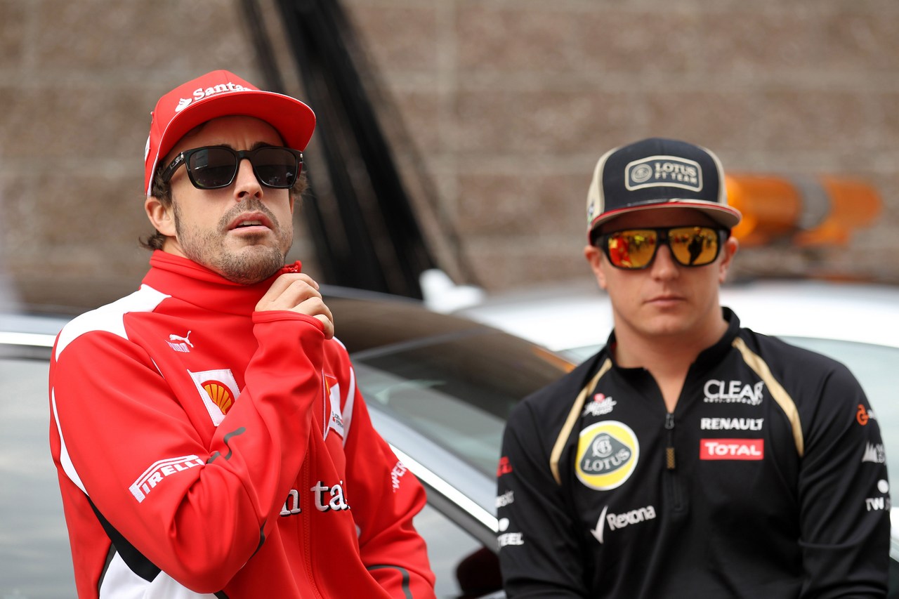 14.10.2012- Fernando Alonso (ESP) Scuderia Ferrari F2012 and Kimi Raikkonen (FIN) Lotus F1 Team E20