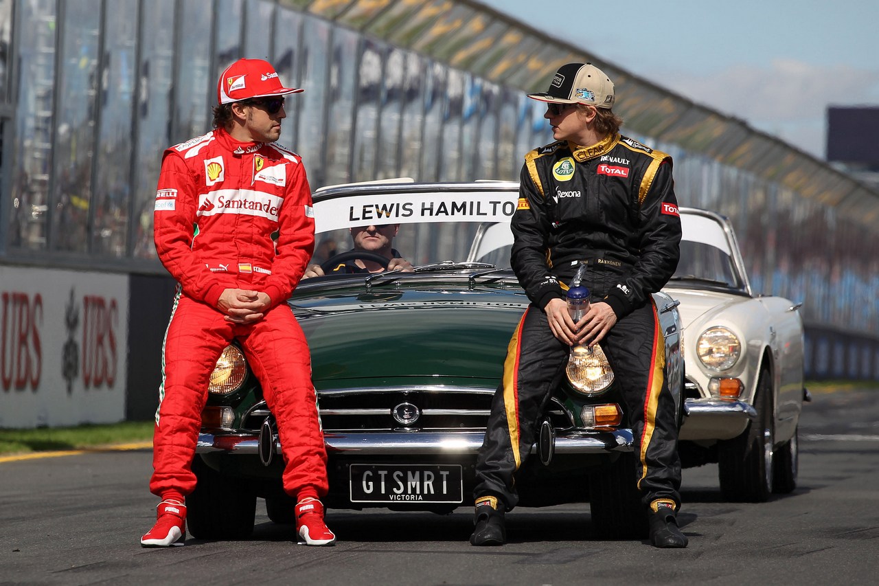 Fernando Alonso (ESP), Scuderia Ferrari and Kimi Raikkonen (FIN), Lotus F1 Team 