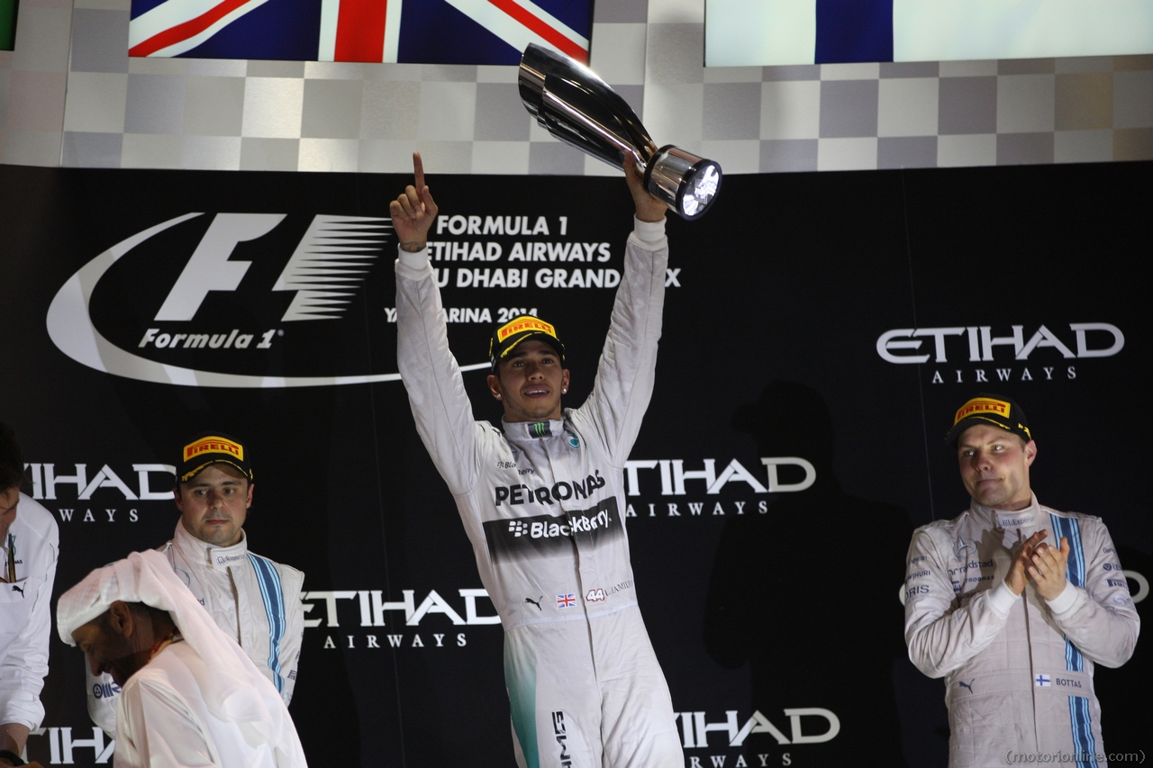 23.11.2014- Race, Lewis Hamilton (GBR) Mercedes AMG F1 W05 race winner and Champion F1 2014, 2nd position Felipe Massa (BRA) Williams F1 Team FW36 and 3rd position Valtteri Bottas (FIN) Williams F1 Team FW36