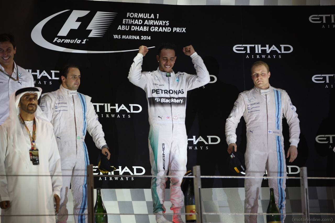 23.11.2014- Race, Lewis Hamilton (GBR) Mercedes AMG F1 W05 race winner and Champion F1 2014, 2nd position Felipe Massa (BRA) Williams F1 Team FW36 and 3rd position Valtteri Bottas (FIN) Williams F1 Team FW36