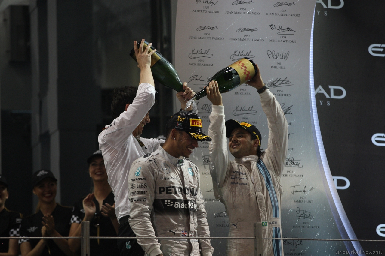 23.11.2014- Race, Lewis Hamilton (GBR) Mercedes AMG F1 W05 race winner and Champion F1 2014, 2nd position Felipe Massa (BRA) Williams F1 Team FW36 and 3rd position Valtteri Bottas (FIN) Williams F1 Team FW36