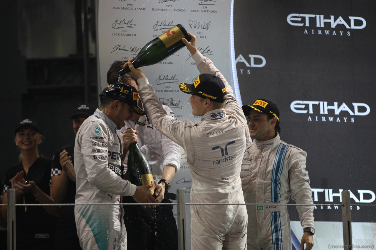 23.11.2014- Race, Lewis Hamilton (GBR) Mercedes AMG F1 W05 race winner and Champion F1 2014, 2nd position Felipe Massa (BRA) Williams F1 Team FW36 and 3rd position Valtteri Bottas (FIN) Williams F1 Team FW36