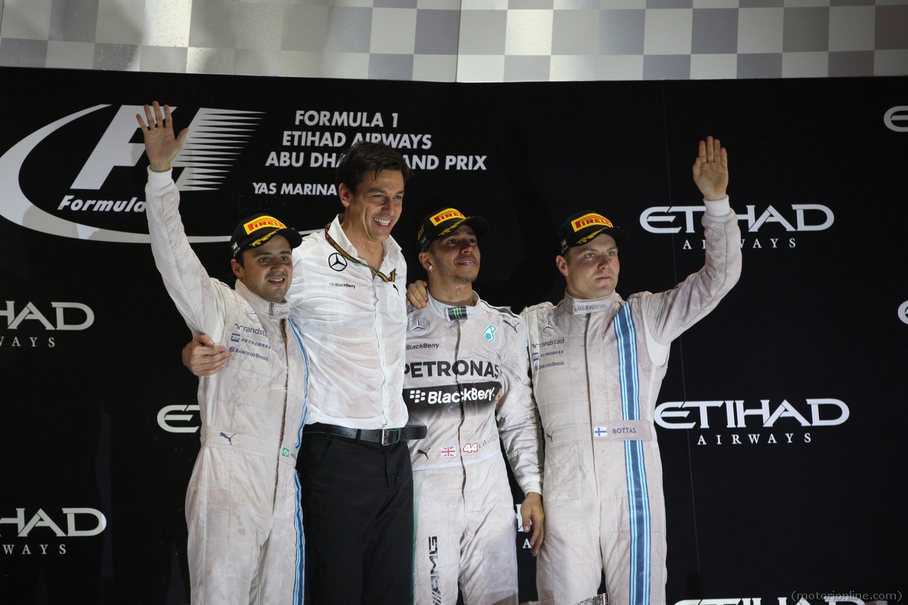 23.11.2014- Race, Lewis Hamilton (GBR) Mercedes AMG F1 W05 race winner and Champion F1 2014, 2nd position Felipe Massa (BRA) Williams F1 Team FW36 and 3rd position Valtteri Bottas (FIN) Williams F1 Team FW36 with Toto Wolff (GER) Mercedes AMG F1 Shareholder and Executive Director