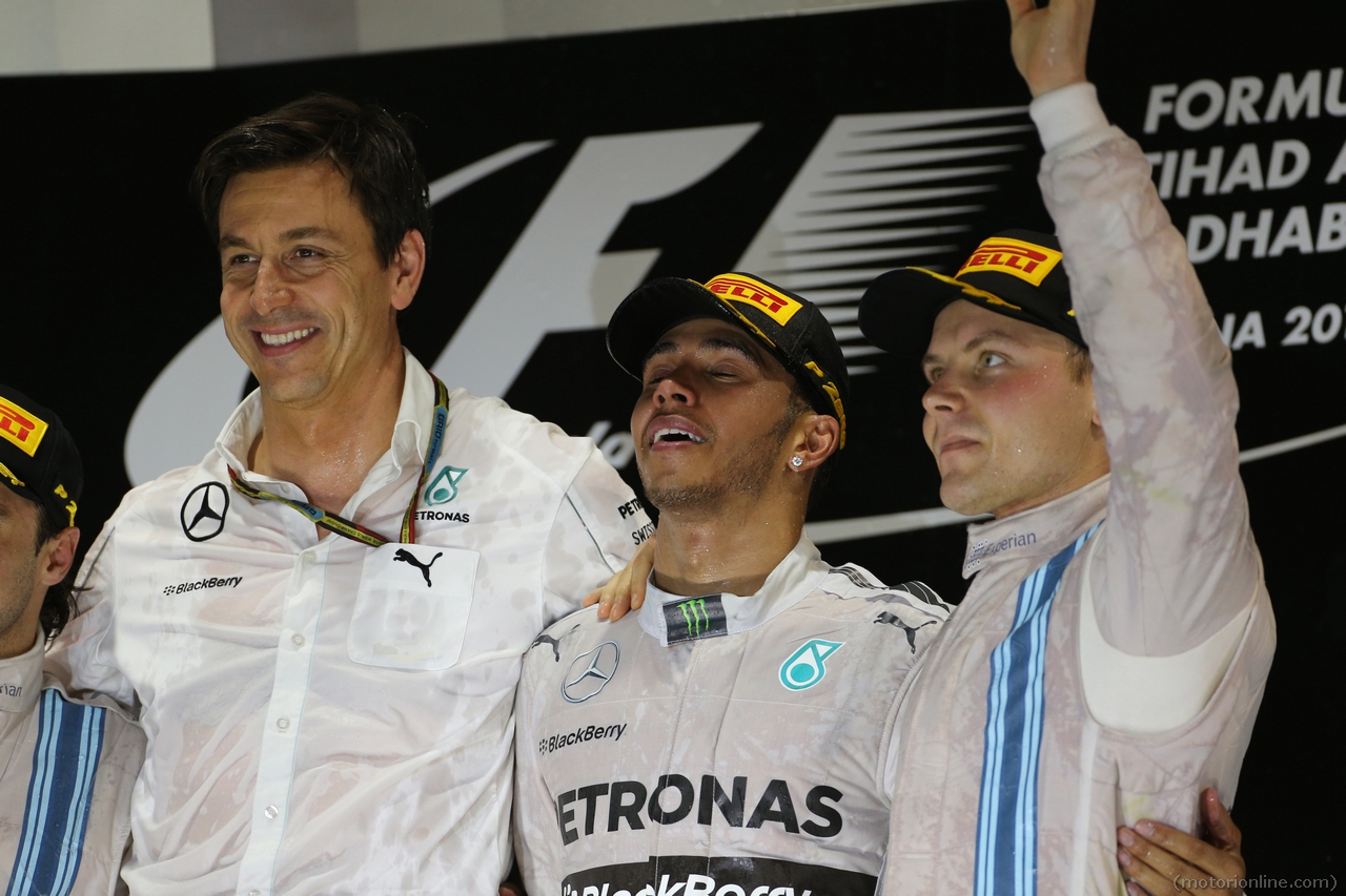 23.11.2014- Race, Toto Wolff (GER) Mercedes AMG F1 Shareholder and Executive Director, Lewis Hamilton (GBR) Mercedes AMG F1 W05 and Valtteri Bottas (FIN) Williams F1 Team FW36