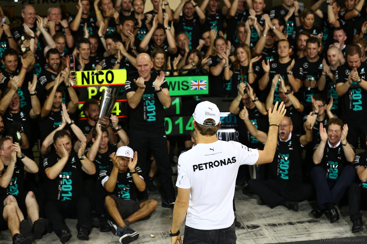 23.11.2014- Race, Celebration, Lewis Hamilton (GBR) Mercedes AMG F1 W05 F1 World Champion 2014 and 2nd position Nico Rosberg (GER) Mercedes AMG F1 W05