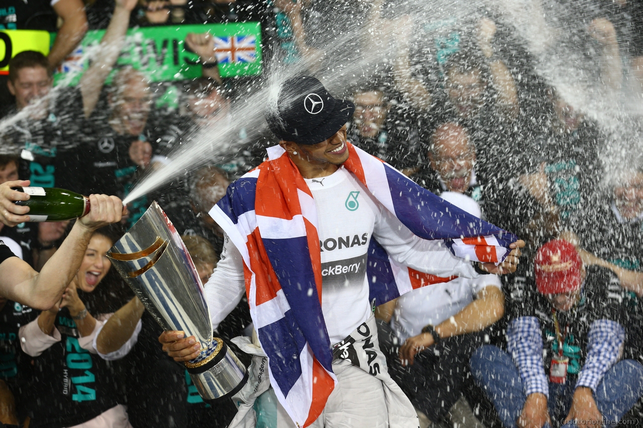 23.11.2014- Race, Celebration, Lewis Hamilton (GBR) Mercedes AMG F1 W05 F1 World Champion 2014 and 2nd position Nico Rosberg (GER) Mercedes AMG F1 W05