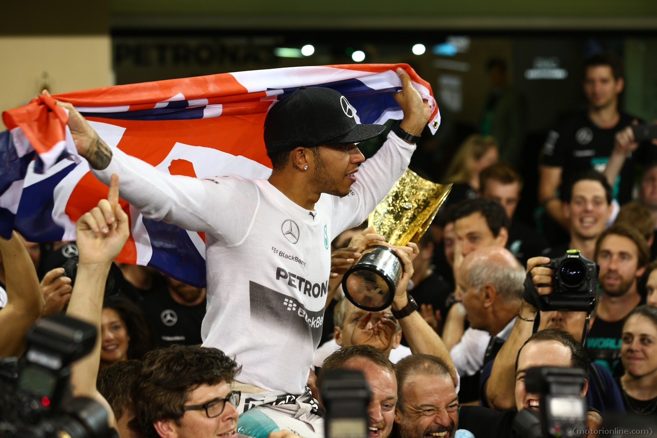 23.11.2014- Race, Celebration, Lewis Hamilton (GBR) Mercedes AMG F1 W05 F1 World Champion 2014 and 2nd position Nico Rosberg (GER) Mercedes AMG F1 W05