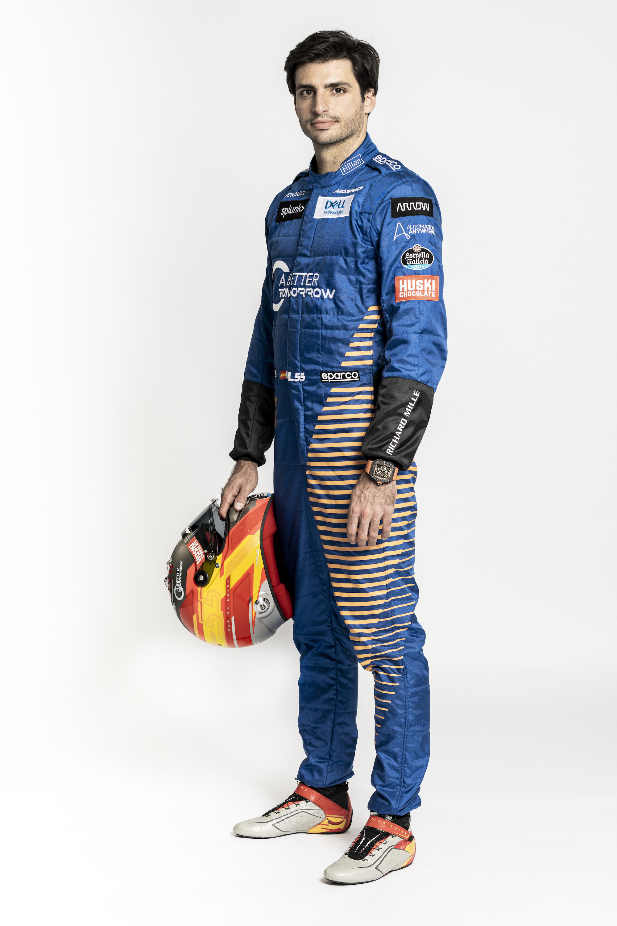 Carlos Sainz holding race helmet side on