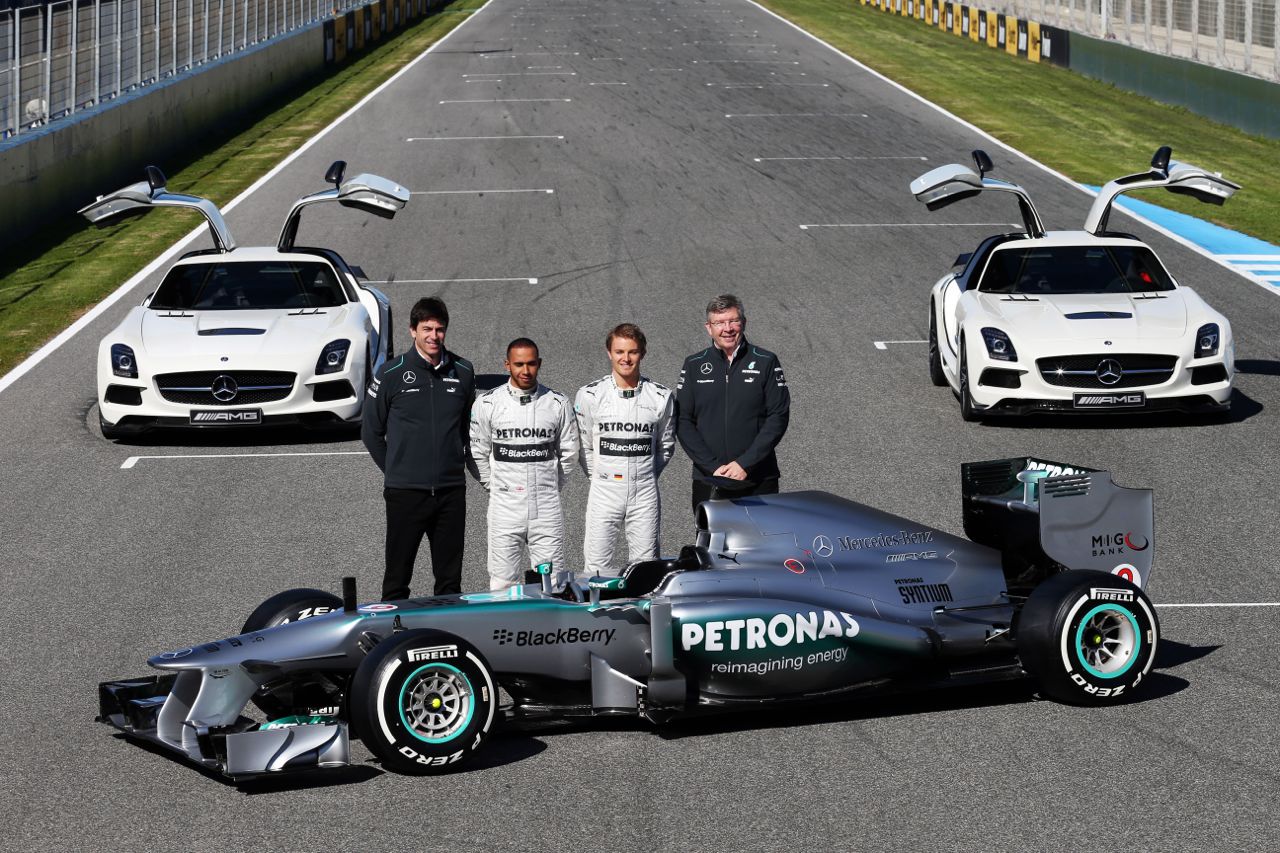 (L to R): Toto Wolff (GER) Mercedes AMG F1 Shareholder and Executive Director; Lewis Hamilton (GBR) Mercedes AMG F1 and team mate Nico Rosberg (GER) Mercedes AMG F1; Ross Brawn (GBR) Mercedes AMG F1 Team Principal; with the new Mercedes AMG F1 W04.

