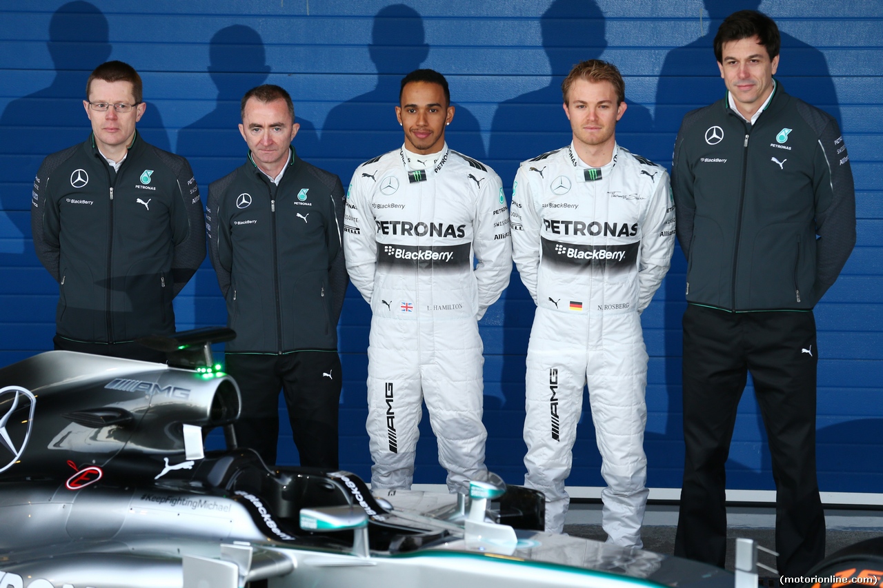 (L to R): Paddy Lowe (GBR) Mercedes AMG F1 Executive Director (Technical); Lewis Hamilton (GBR) Mercedes AMG F1; Nico Rosberg (GER) Mercedes AMG F1; and Toto Wolff (GER) Mercedes AMG F1 Shareholder and Executive Director, at the unveiling of the new Mercedes AMG F1 W05.
28.01.2014. Formula One Testing, Day One, Jerez, Spain.