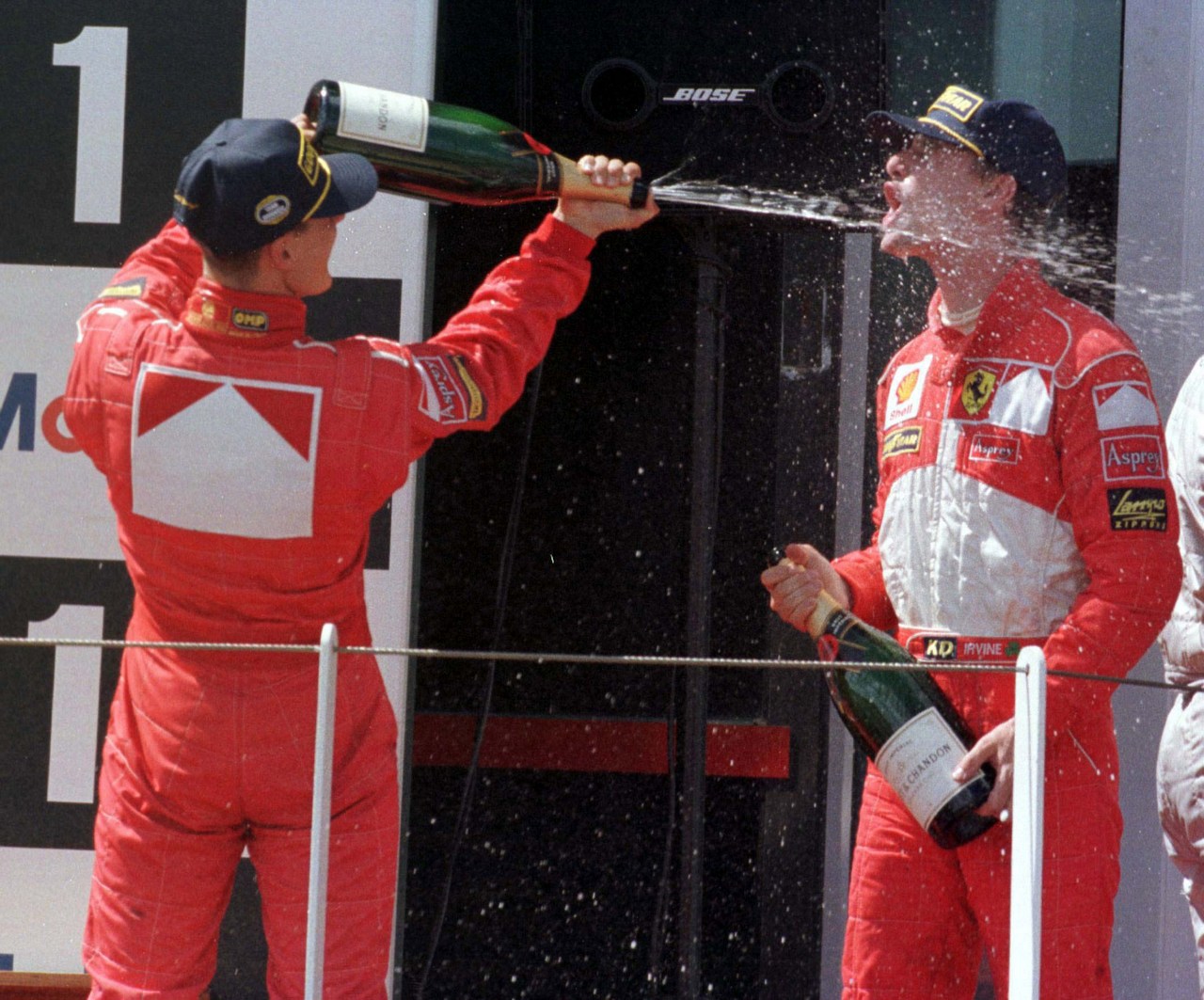 
Race winner Michael Schumacher sprays second place Eddie Irvine at the French Grand Prix.
