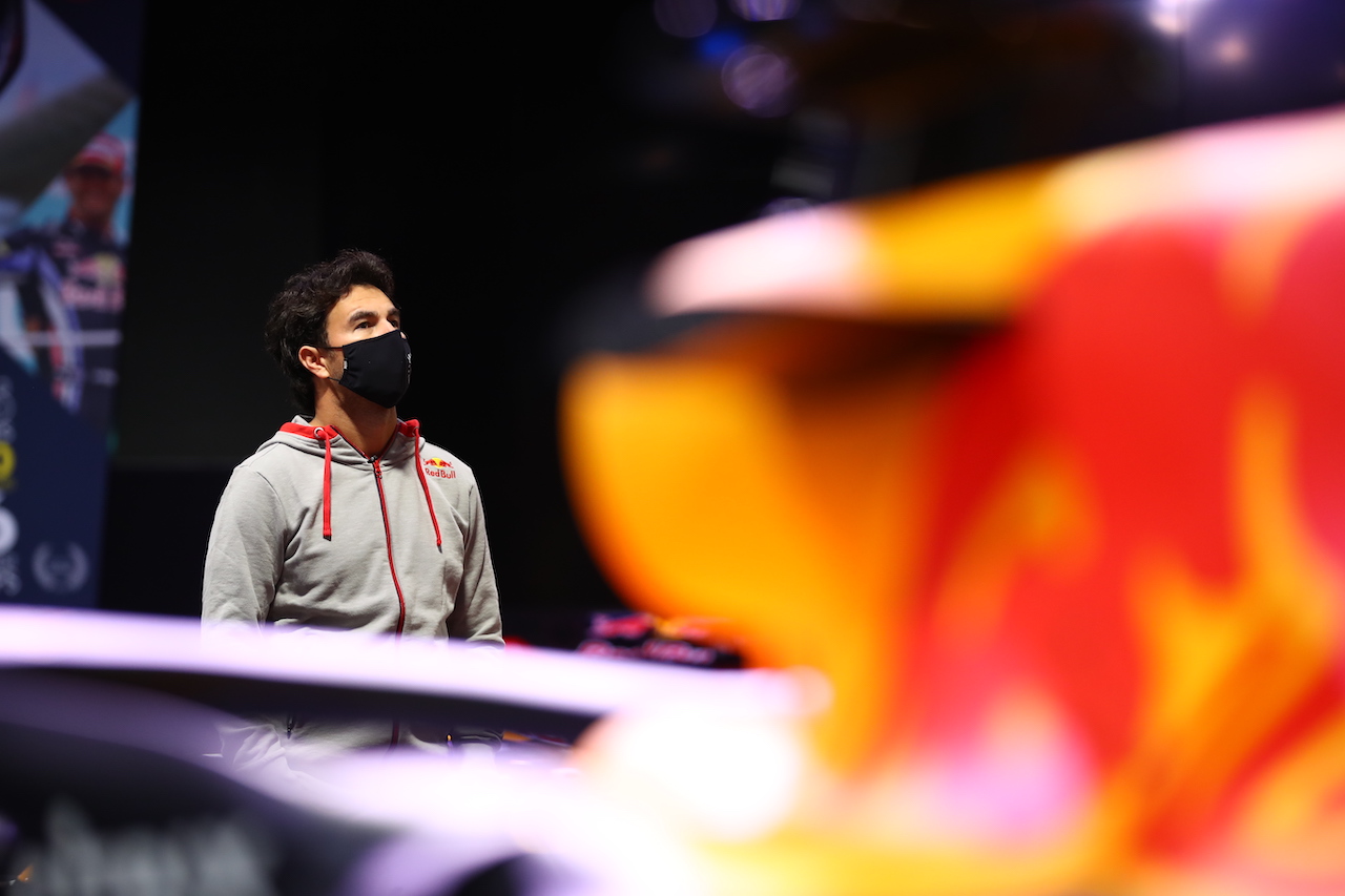 MILTON KEYNES, ENGLAND - JANUARY 11: Sergio Perez of Mexico and Red Bull Racing looks at the history of the team at MK-7 at Red Bull Racing Factory on January 11, 2021 in Milton Keynes, England. (Photo by Mark Thompson/Getty Images)