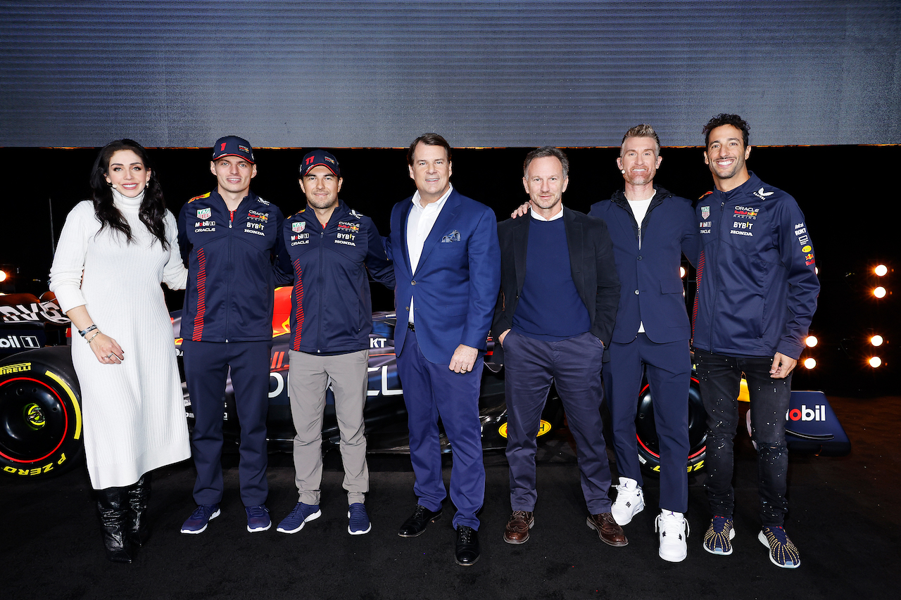 (L-R) Giselle Zarur, Max Verstappen of the Netherlands and Oracle Red Bull Racing, Sergio Perez of Mexico and Oracle Red Bull Racing, Jim Farley, CEO of Ford, Red Bull Racing Team Principal Christian Horner, Marty Smith and Daniel Ricciardo of Australia and Oracle Red Bull Racing pose for a photo during the Oracle Red Bull Racing Season Launch 2023 at Classic Car Club Manhattan on February 03, 2023 in New York City. (Photo by Mike Coppola/Getty Images for Oracle Red Bull Racing) // FIA / Getty Images / Red Bull Content Pool // SI202302030516 // Usage for editorial use only // 