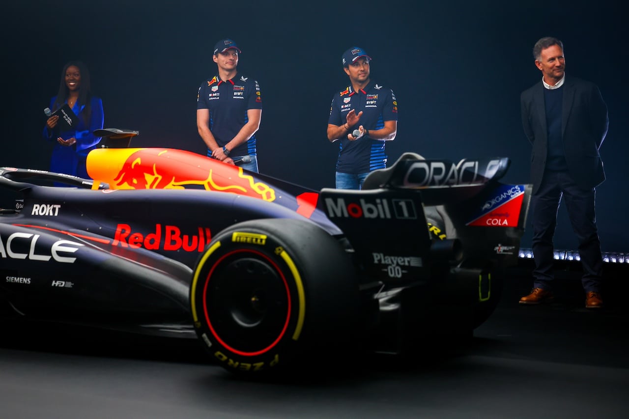 MILTON KEYNES, ENGLAND - FEBRUARY 15: Max Verstappen of the Netherlands and Oracle Red Bull Racing, Sergio Perez of Mexico and Oracle Red Bull Racing and Red Bull Racing Team Principal Christian Horner stand with the RB20 during the Oracle Red Bull Racing RB20 car launch at Red Bull Racing Factory on February 15, 2024 in Milton Keynes, England. (Photo by Mark Thompson/Getty Images for Red Bull Racing) // SI202402150752 // Usage for editorial use only // 