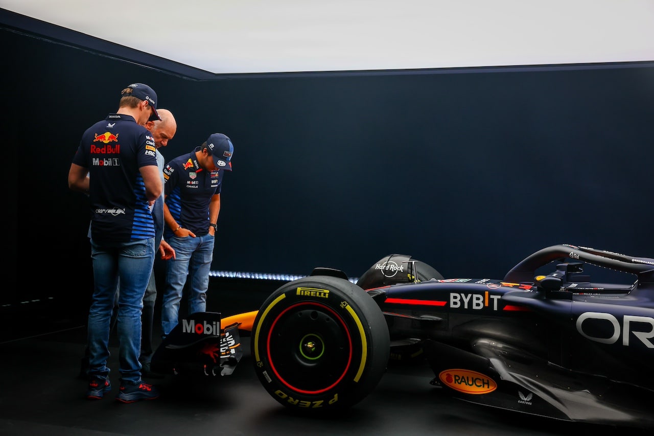MILTON KEYNES, ENGLAND - FEBRUARY 15: Max Verstappen of the Netherlands and Oracle Red Bull Racing and Sergio Perez of Mexico and Oracle Red Bull Racing look at the RB20 with Adrian Newey, the Chief Technical Officer of Red Bull Racing during the Oracle Red Bull Racing RB20 car launch at Red Bull Racing Factory on February 15, 2024 in Milton Keynes, England. (Photo by Mark Thompson/Getty Images for Red Bull Racing) // SI202402150759 // Usage for editorial use only // 