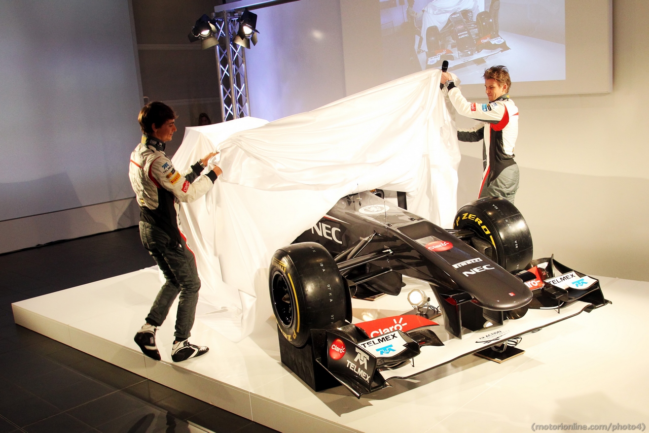 (L to R): Esteban Gutierrez (MEX) Sauber and team mate Nico Hulkenberg (GER) Sauber unveil the Sauber C32.
