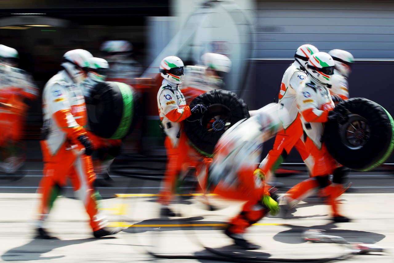 Sahara Force India F1 Team mechanics practice a pit stop.
