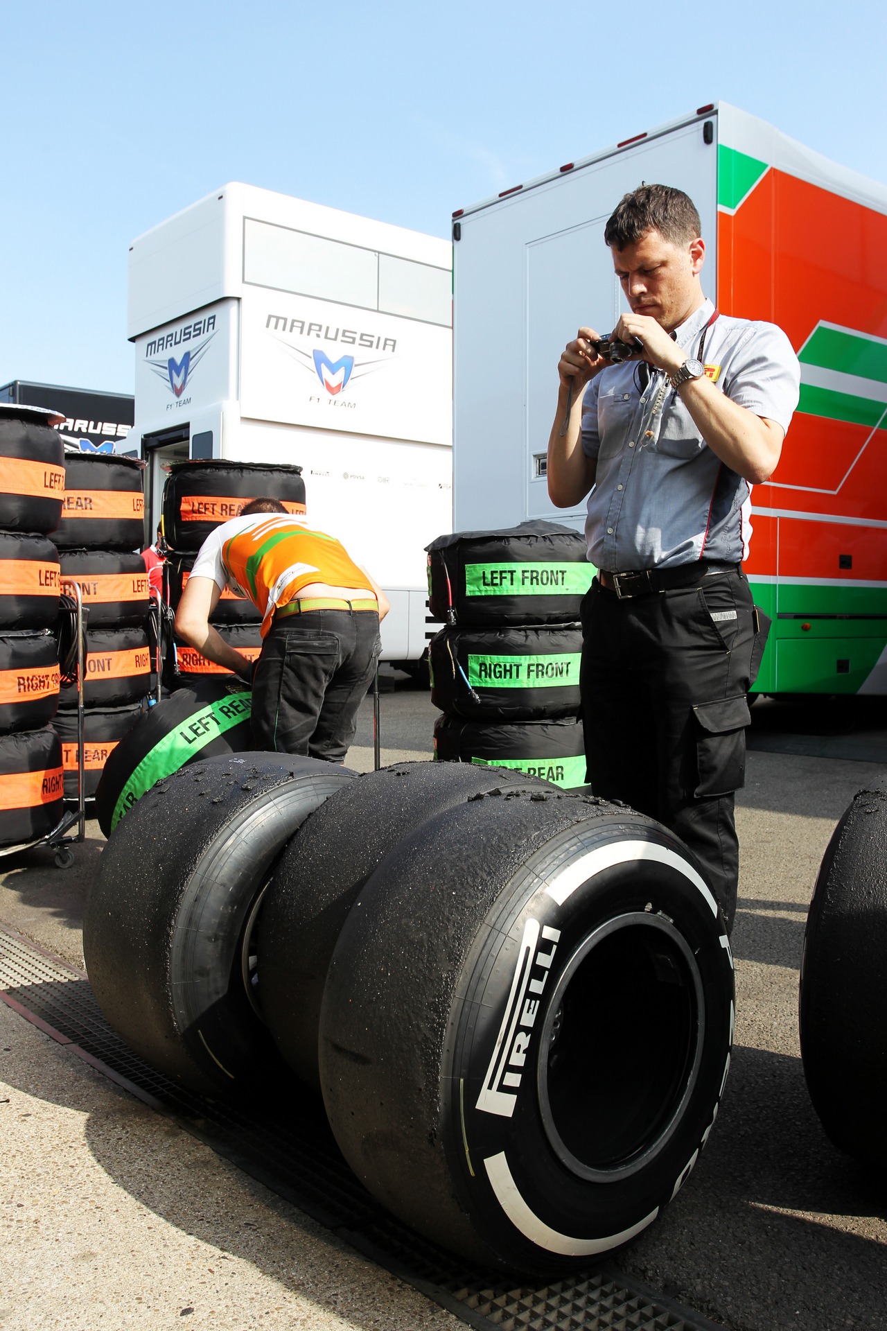 Pirelli Tyre Technician checks Sahara Force India F1 Team Pirelli tyres.
